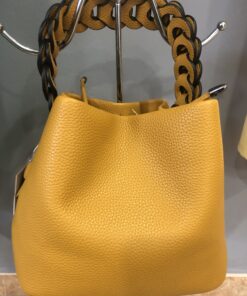 Bolso trenzado mostaza pequeño de polipiel ajustable