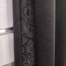Pantalón de punto ancho con tira lateral de encaje