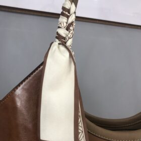 Bolso camel grande con parches animal print único