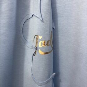 Chándal oversize azul cielo con detalles flor