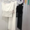 Conjunto falda y top de gasa negro y blanco elegante