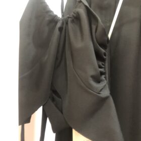 Conjunto elegante top volante y pantalón fluido